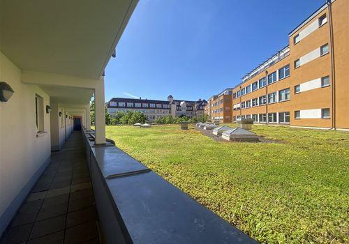 Zugang zur Wohnung über Laubengang