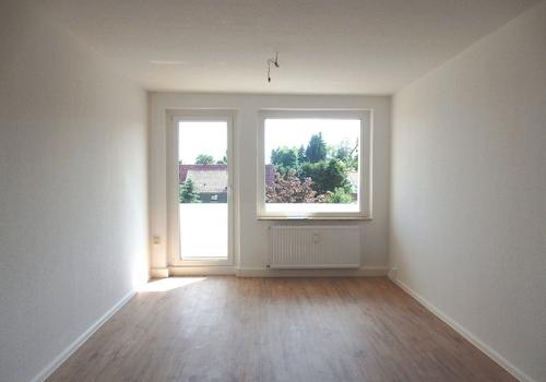 Wohnzimmer mit Balkon