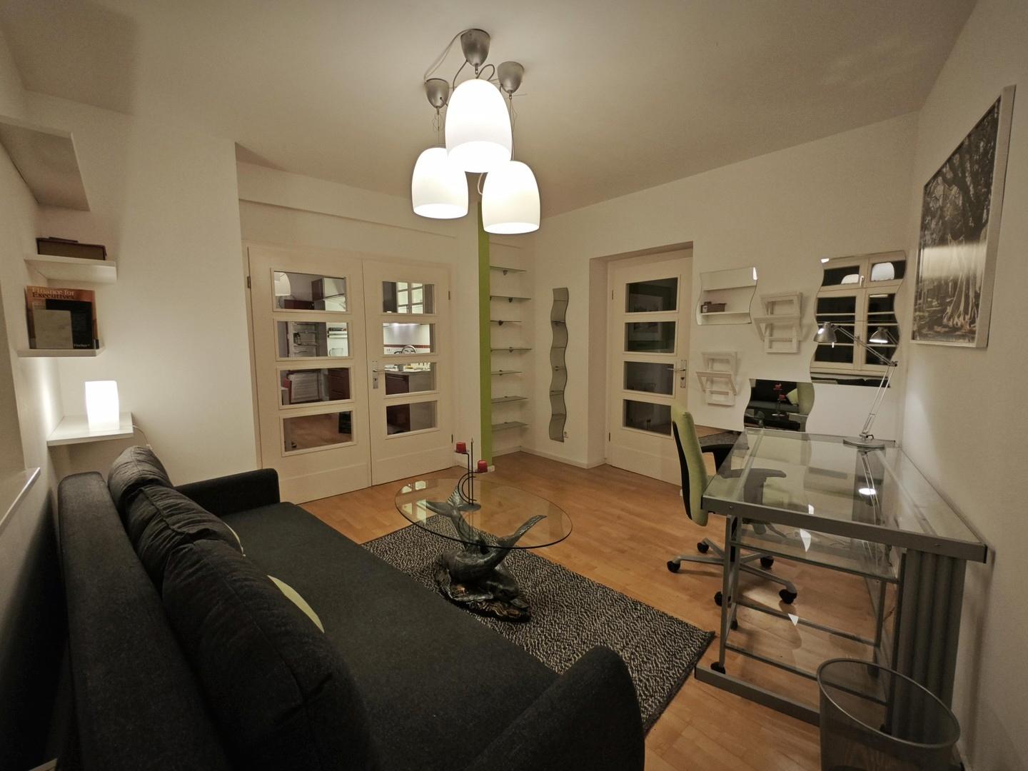 Das Wohnzimmer mit Schlafsofa