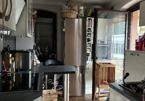 Küche im OG mit schönen Holzdielen und kl. Balkon