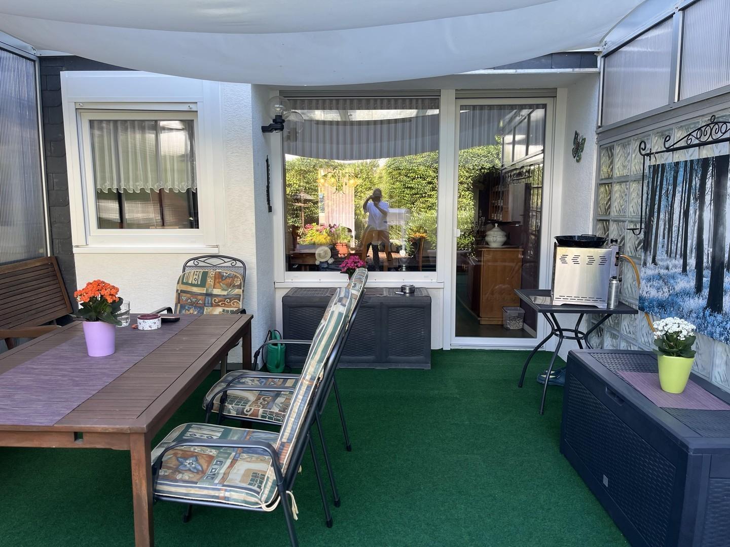 Terrasse mit Glasüberdachung