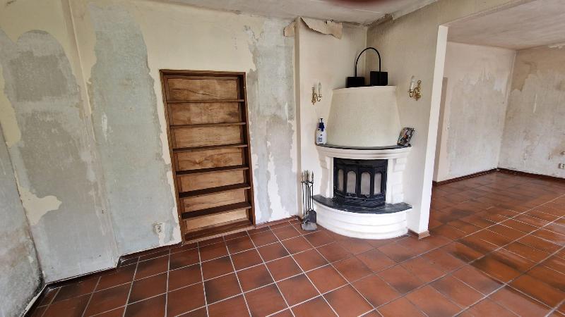 Ansicht Wohnzimmer mit Kaminofen