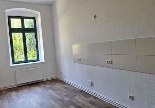 Küche mit Fliesenspiegel