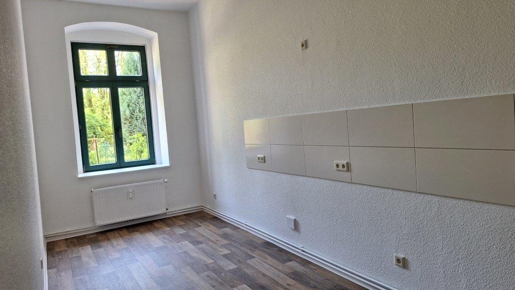 Küche mit Fliesenspiegel