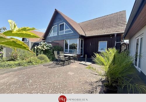 H&T Immobilien - Reihenendhaus in Weyhe