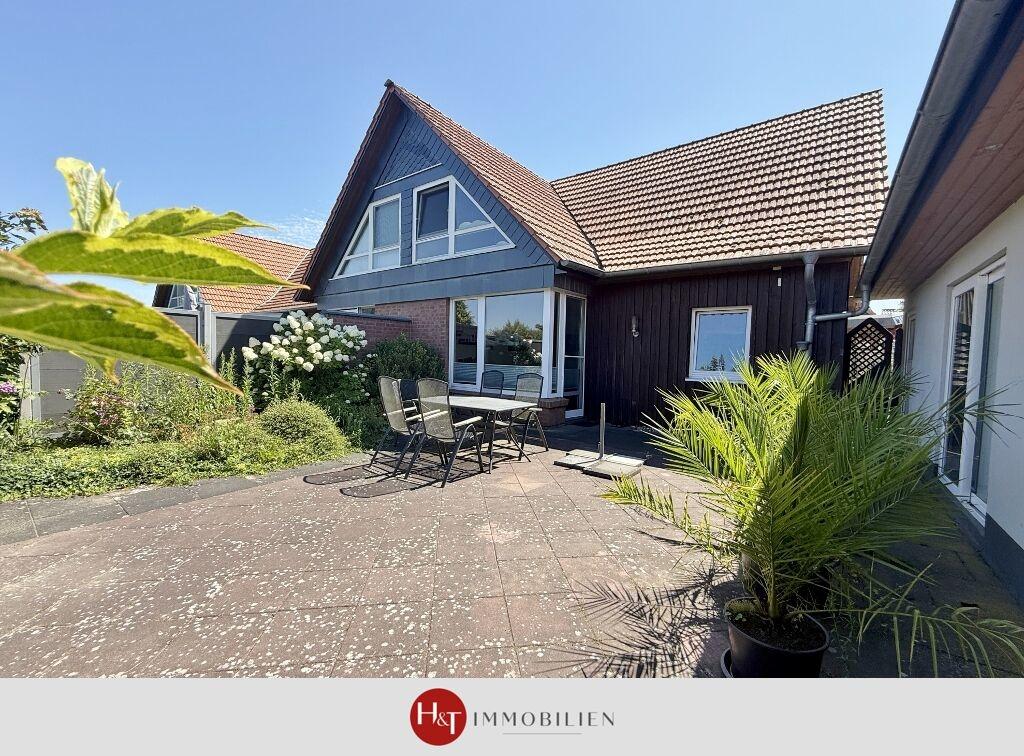 H&T Immobilien - Reihenendhaus in Weyhe