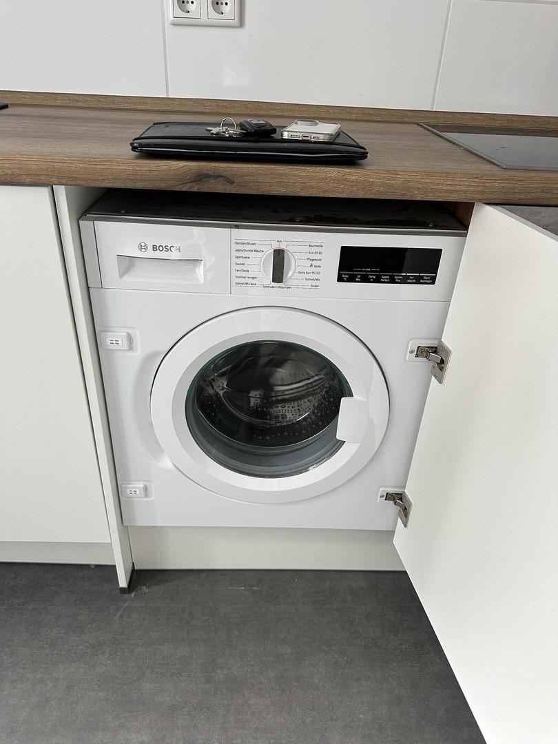 Waschmaschine in Einbauküche