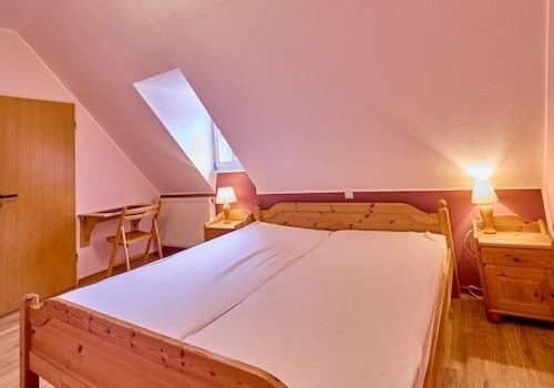 eines der Gästezimmer