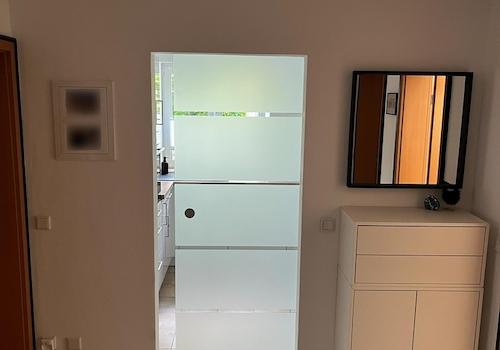 Flur + Glasschiebetüre Küche