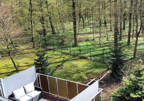 Balkon mit Waldblick