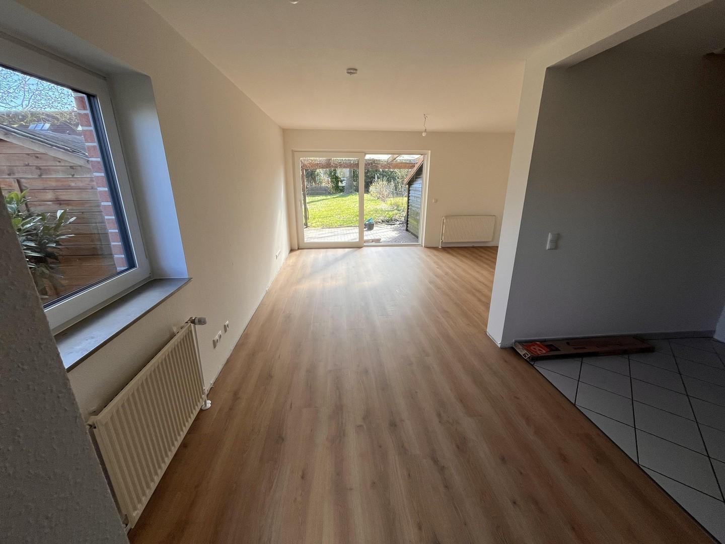 Wohnzimmer mit Gartenblick